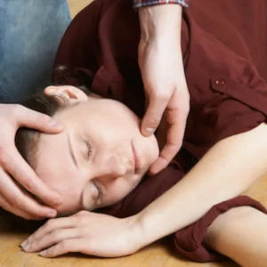 Demonstrating Recovery Position During CPR Training